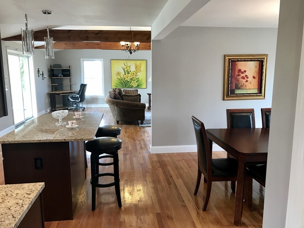 635 Piper Road West Springfield, MA 01089 - Photo 3 of 24 a view of a dining room with furniture and a potted plant