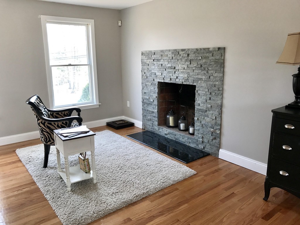 635 Piper Road West Springfield, MA 01089 - Photo 8 of 24 a living room with furniture and a fireplace