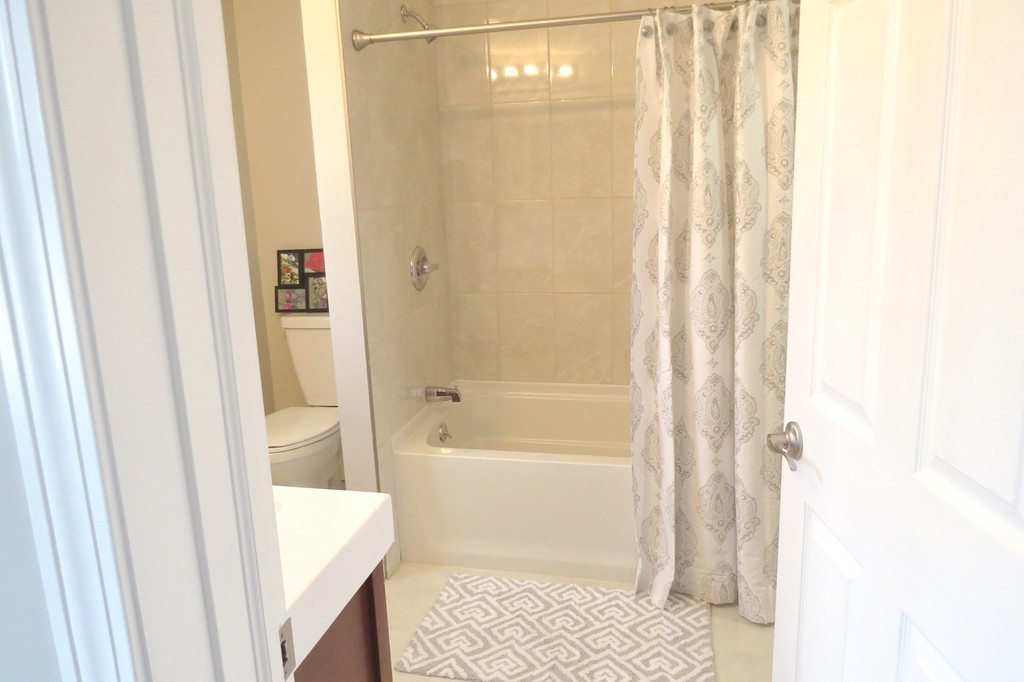 635 Piper Road West Springfield, MA 01089 - Photo 10 of 24 a bathroom with a bathtub and a shower