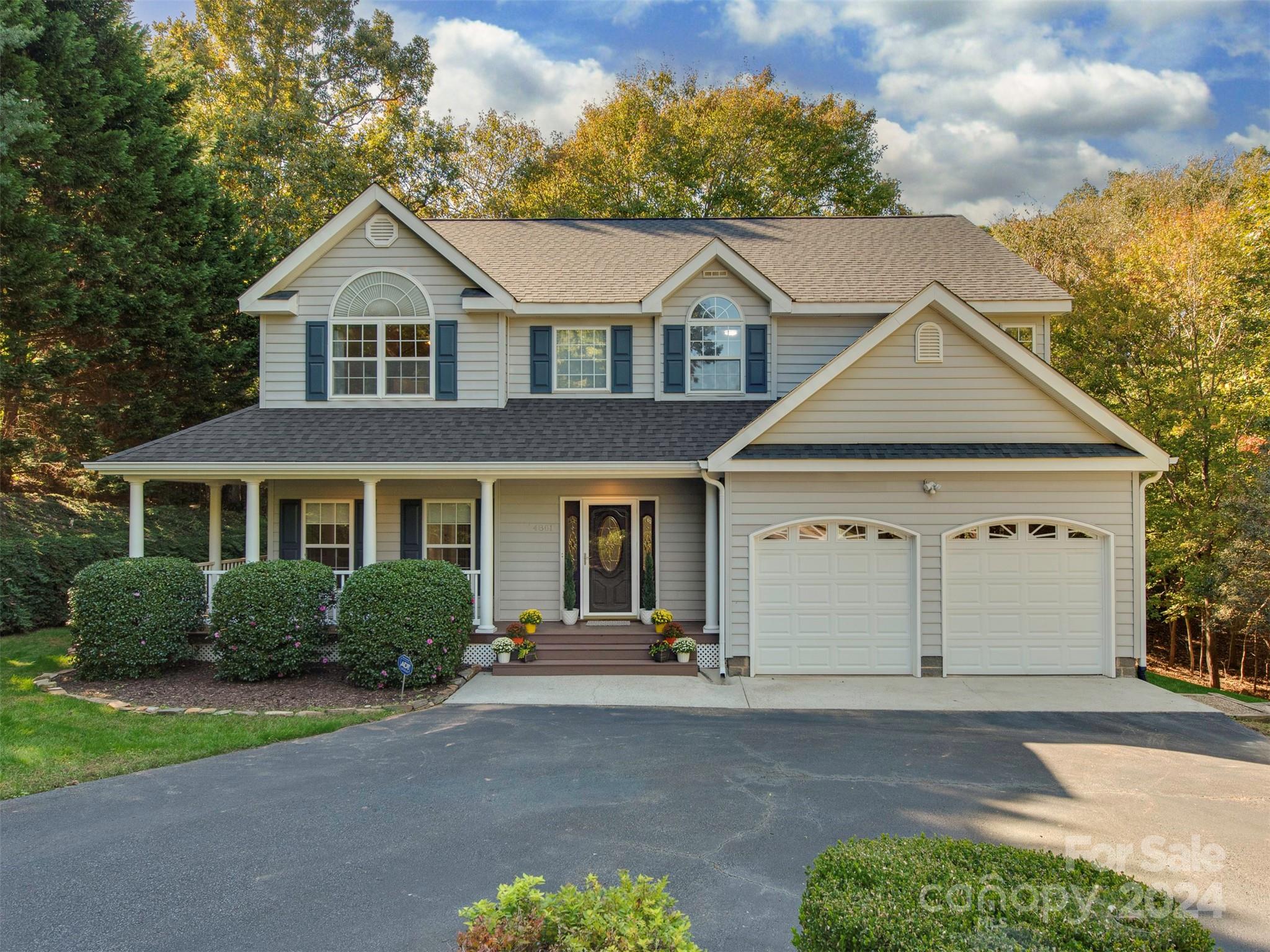 4801 Steepleton Way Charlotte, NC 28215 - Photo 1 of 28 a view of a white house next to a yard and road