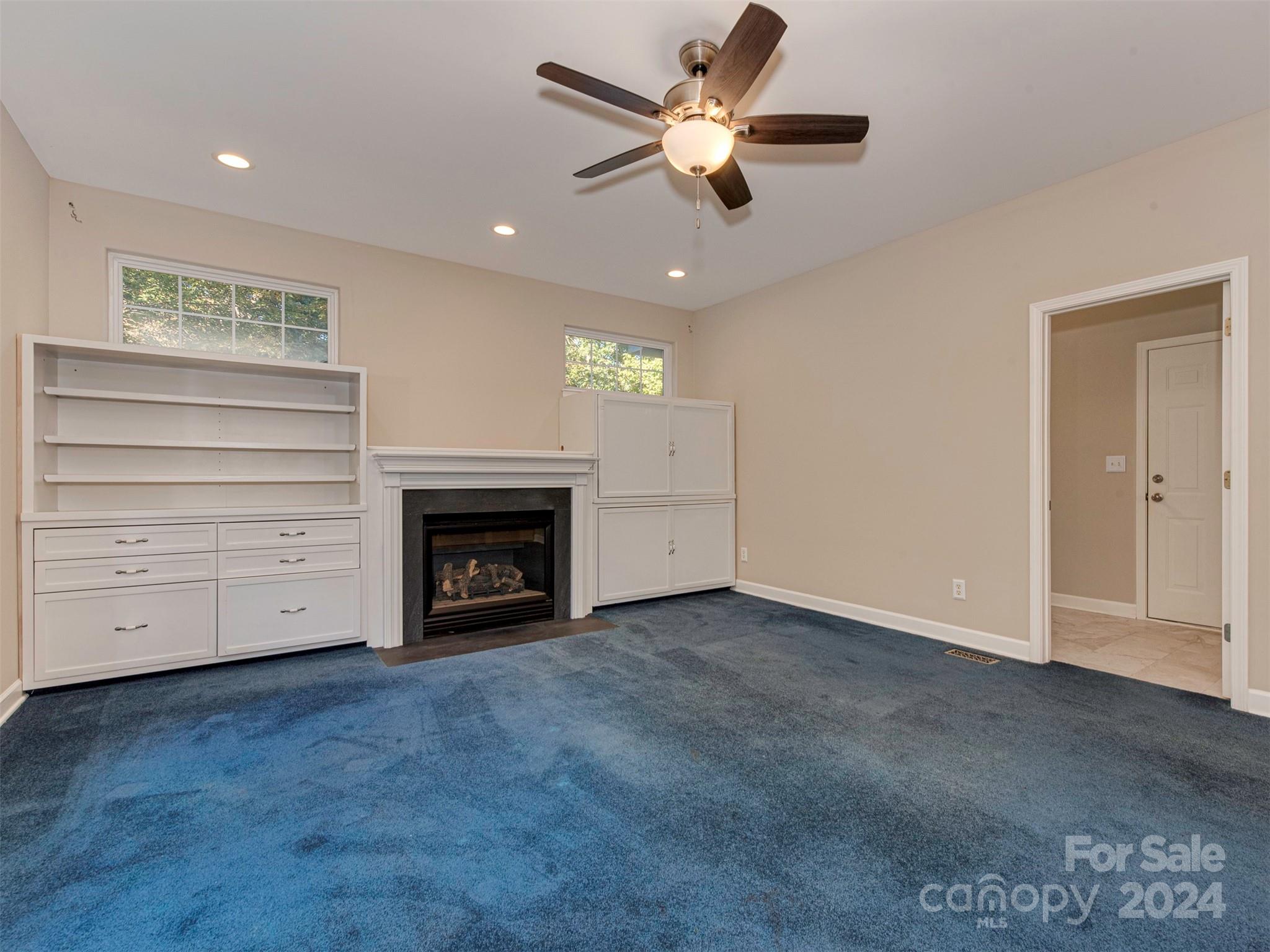 4801 Steepleton Way Charlotte, NC 28215 - Photo 6 of 28 a view of an empty room with a fireplace