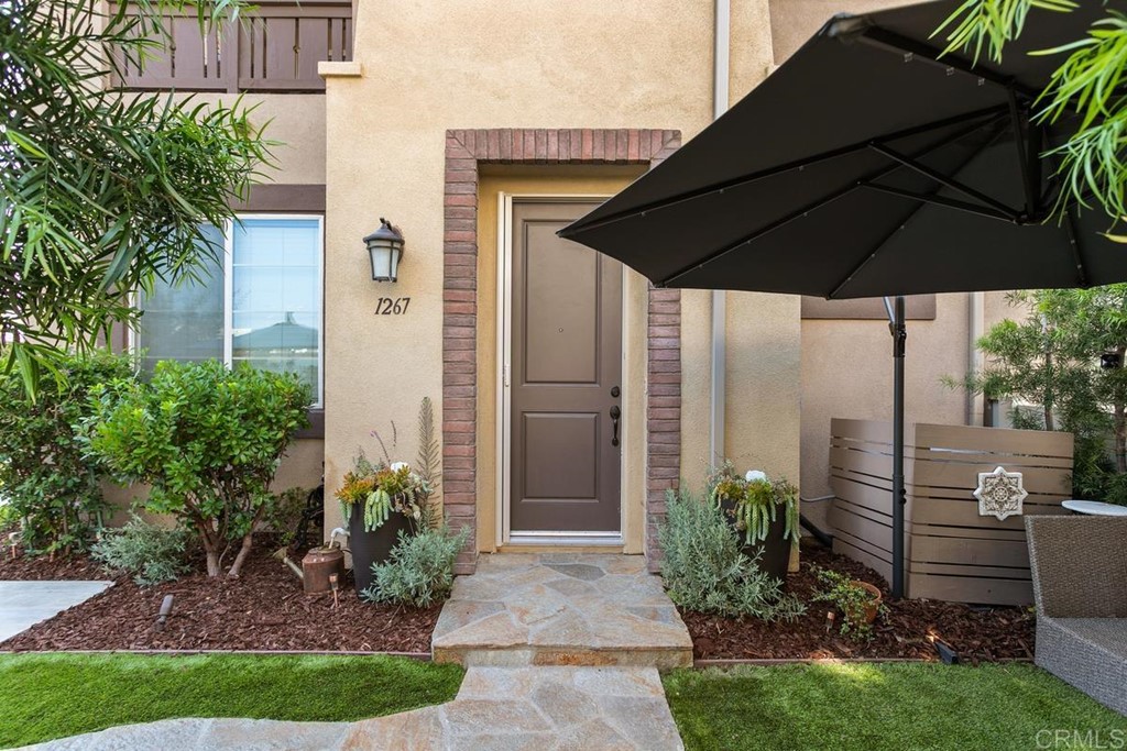 1267 Via Lucero Oceanside, CA 92056 - Photo 36 of 44 a view of a house with backyard and garden