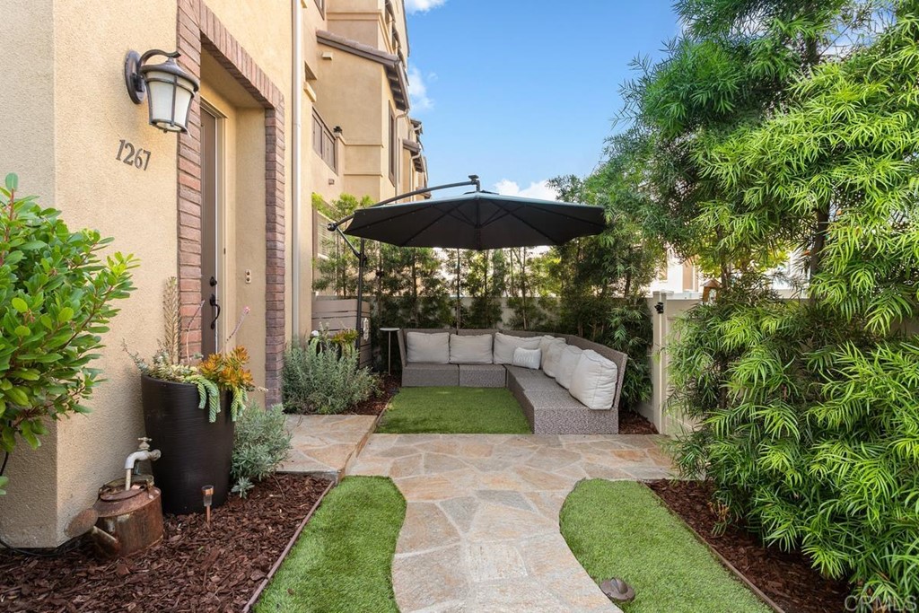 1267 Via Lucero Oceanside, CA 92056 - Photo 5 of 44 a view of a garden with patio
