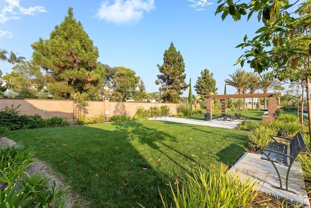 1267 Via Lucero Oceanside, CA 92056 - Photo 44 of 44 a view of yard with swimming pool and green space