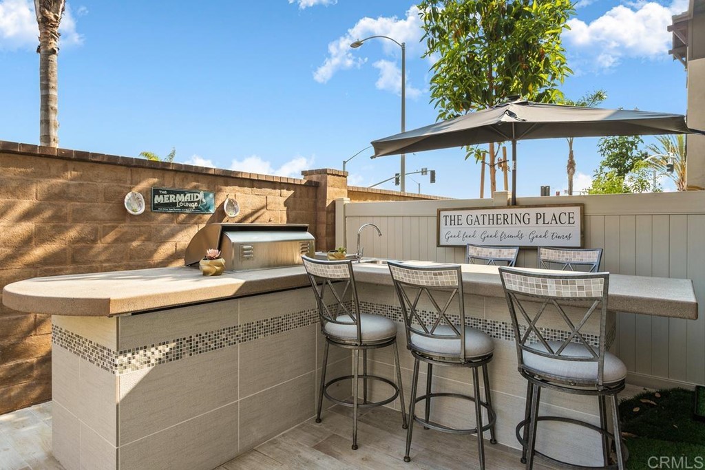 1267 Via Lucero Oceanside, CA 92056 - Photo 8 of 44 a view of a chairs and table in the terrace