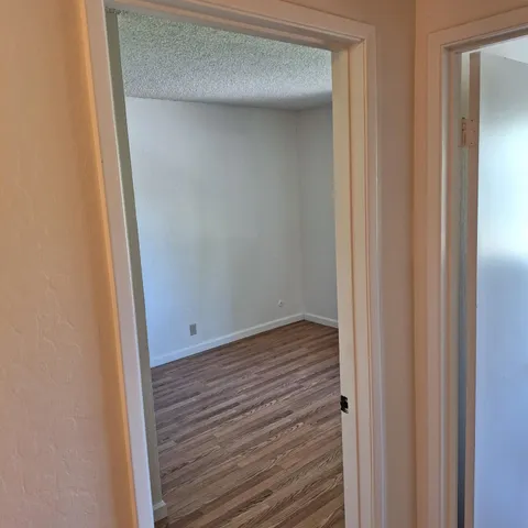 a view of an empty walk in closet