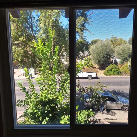 a view of an empty room and window