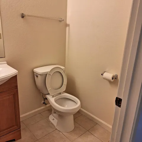 a kitchen with a sink a stove and a microwave