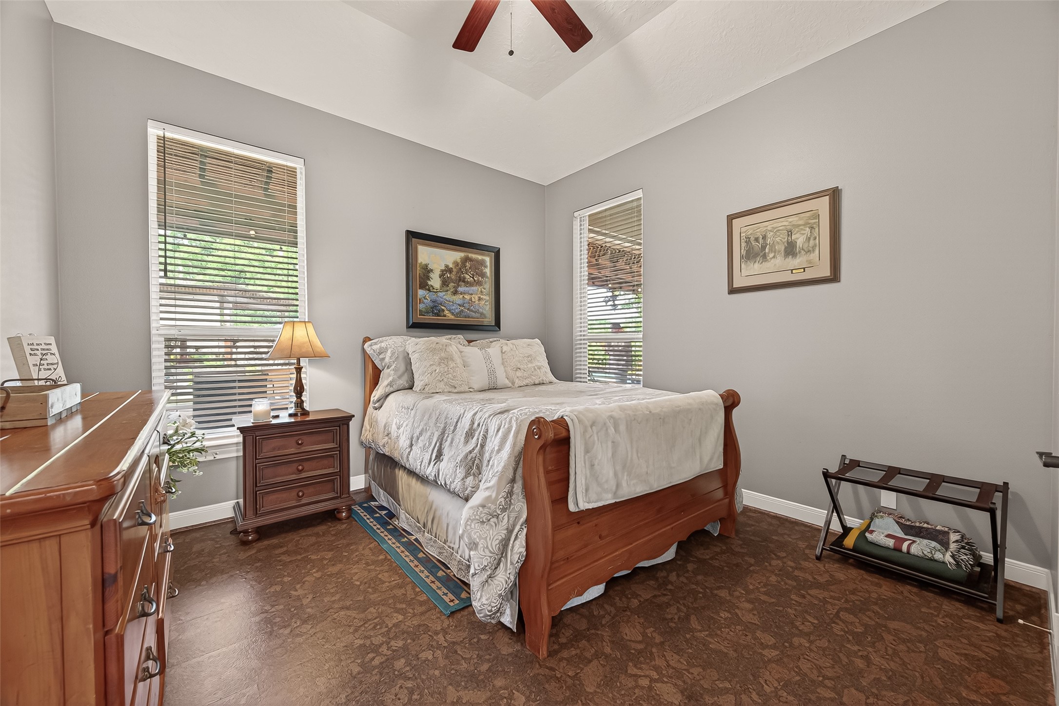 2319 Braer Ridge Drive Katy, TX 77494 - Photo 17 of 50 a spacious bedroom with a bed and a dresser next to a window