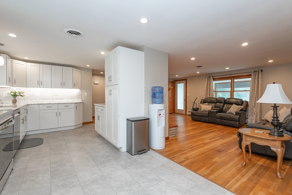 251 Centre Street Danvers, MA 01923 - Photo 19 of 42 a living room with furniture and a wooden floor