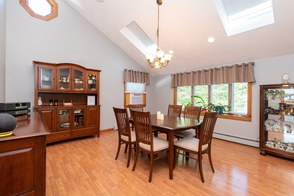 251 Centre Street Danvers, MA 01923 - Photo 26 of 42 a view of a dining room with furniture window and wooden floor