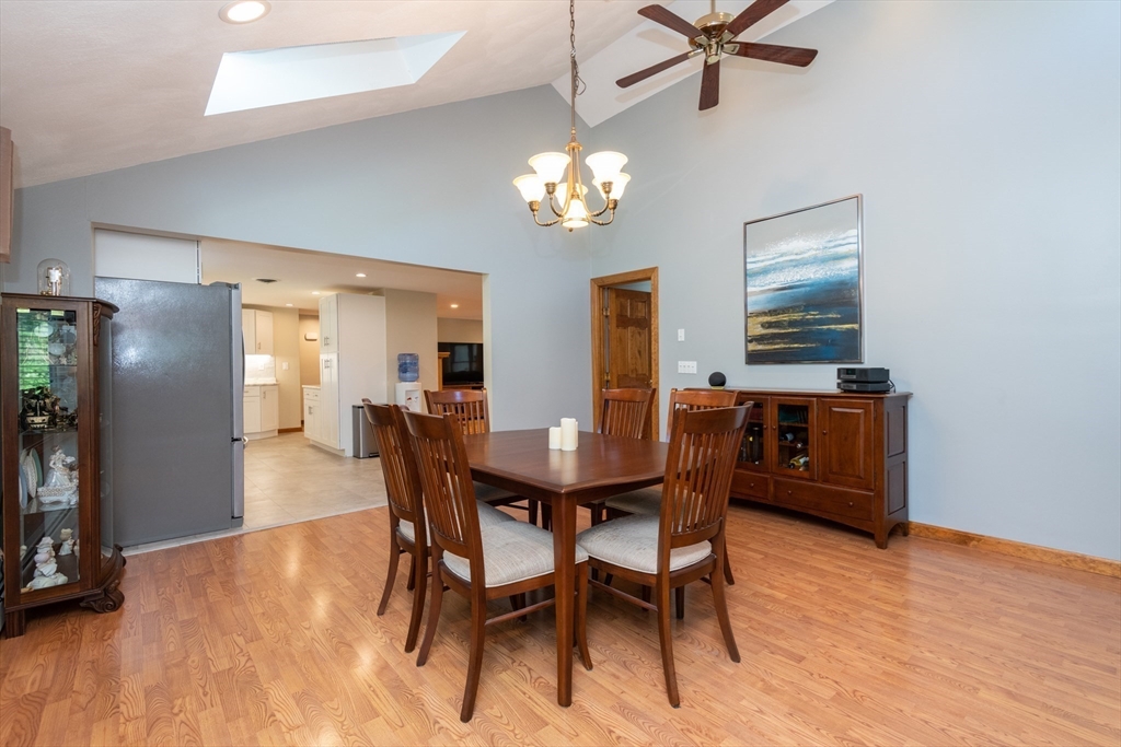 251 Centre Street Danvers, MA 01923 - Photo 27 of 42 a view of a dining room with furniture and chandelier