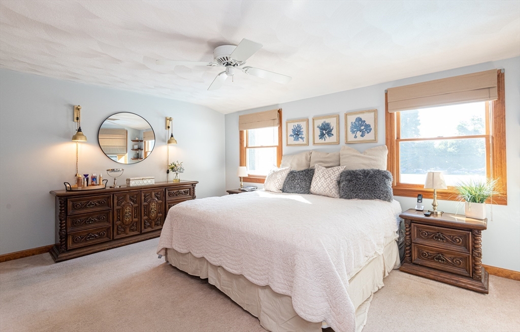 251 Centre Street Danvers, MA 01923 - Photo 29 of 42 a bedroom with a bed and a dresser