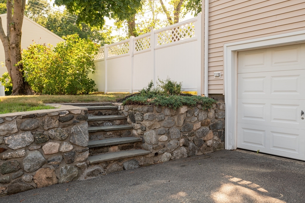 251 Centre Street Danvers, MA 01923 - Photo 3 of 42 a front view of a house with a garden