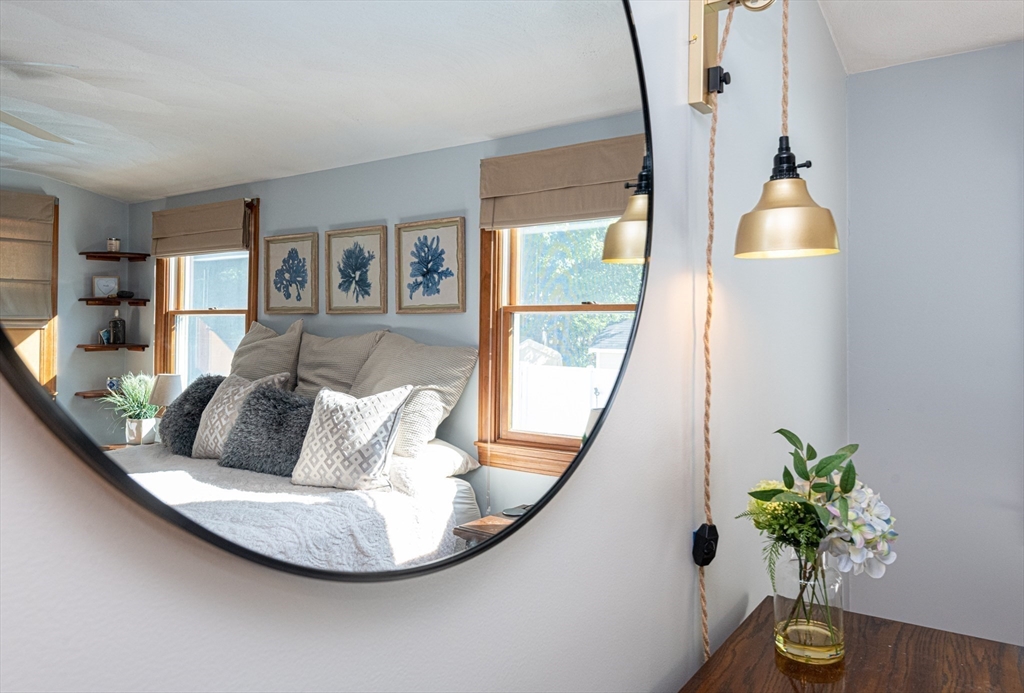 251 Centre Street Danvers, MA 01923 - Photo 31 of 42 a living room with furniture and a potted plant