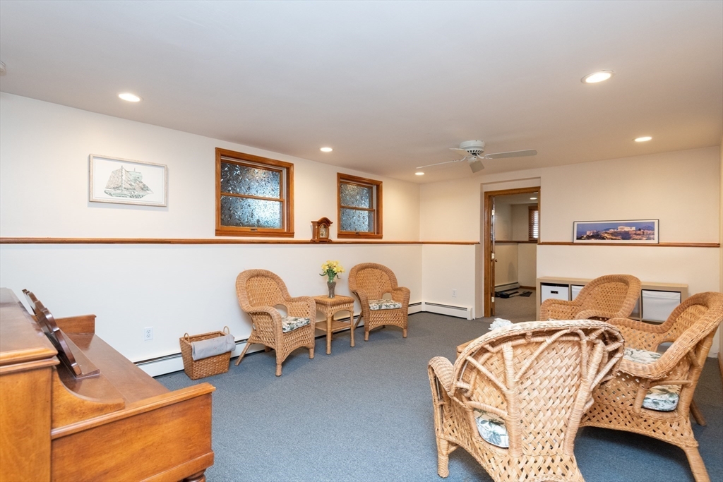 251 Centre Street Danvers, MA 01923 - Photo 42 of 42 a bedroom with furniture and a bed