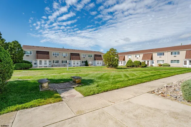 a house view with garden space