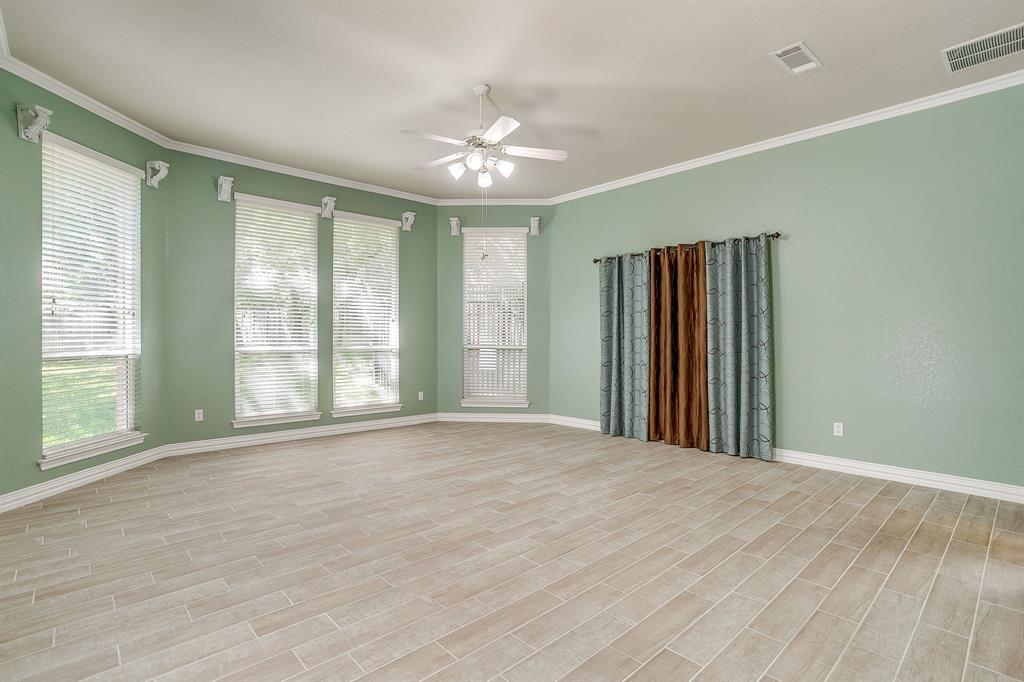 312 Oak Ridge Drive Burleson, TX 76028 - Photo 26 of 40 a view of an empty room with a window