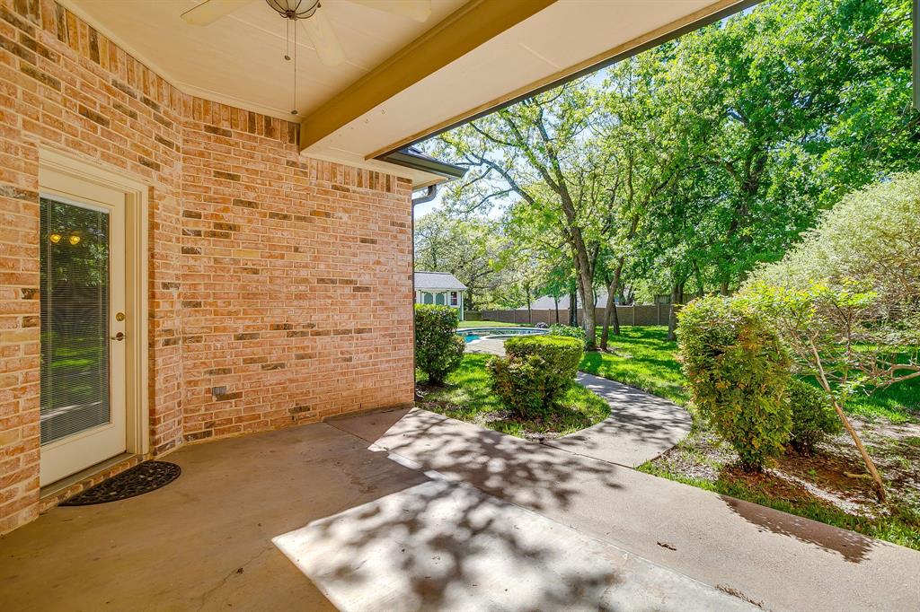 312 Oak Ridge Drive Burleson, TX 76028 - Photo 34 of 40 a view of a pathway with a yard