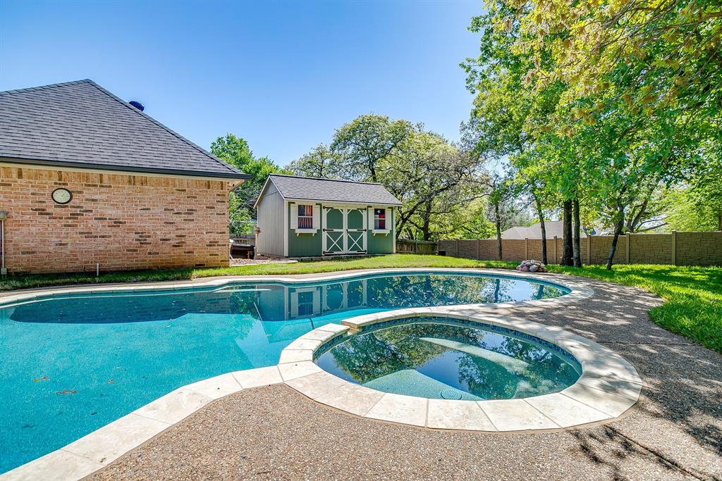 312 Oak Ridge Drive Burleson, TX 76028 - Photo 37 of 40 a view of outdoor space yard and swimming pool