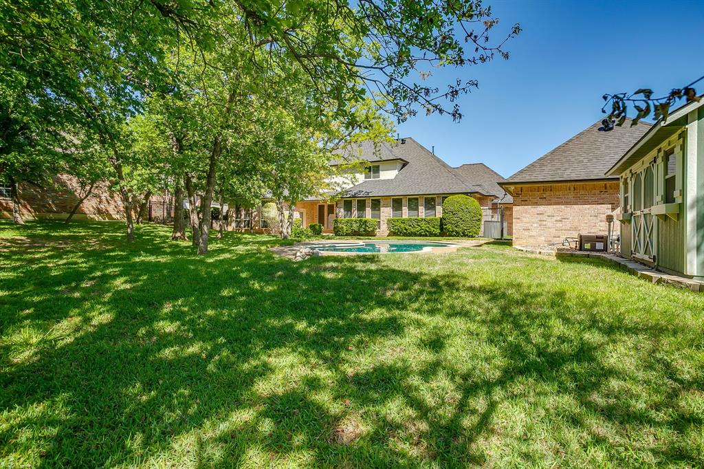 312 Oak Ridge Drive Burleson, TX 76028 - Photo 38 of 40 a view of a house with a big yard