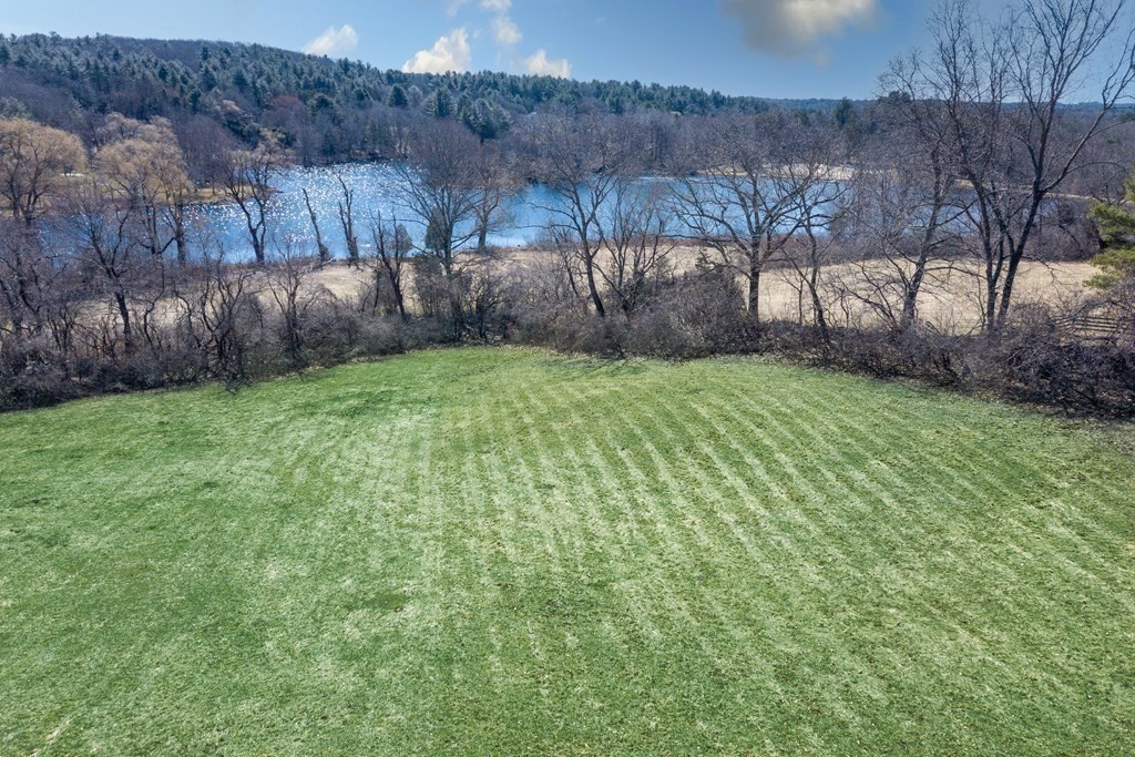 Lot 7 Conant Road Lincoln, MA 01773 - Photo 8 of 12 a view of a backyard