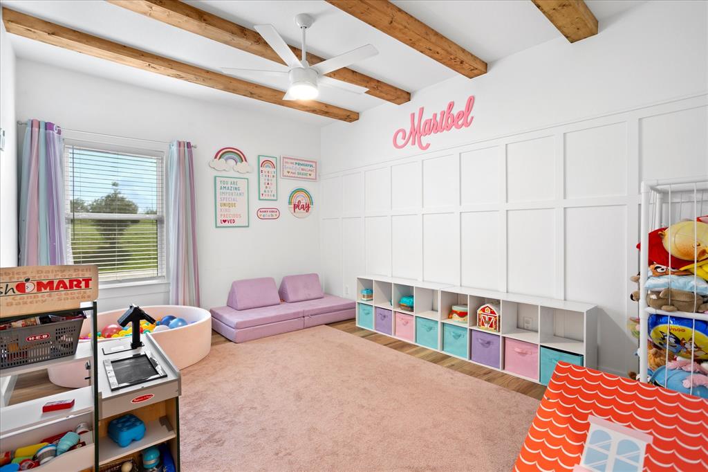 1074 Pioneer Crossing Weatherford, TX 76088 - Photo 30 of 36 a bedroom with furniture and a book shelf