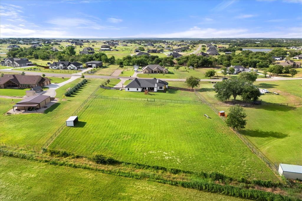 1074 Pioneer Crossing Weatherford, TX 76088 - Photo 35 of 36 a view of a city with lots of residential buildings ocean and mountain view