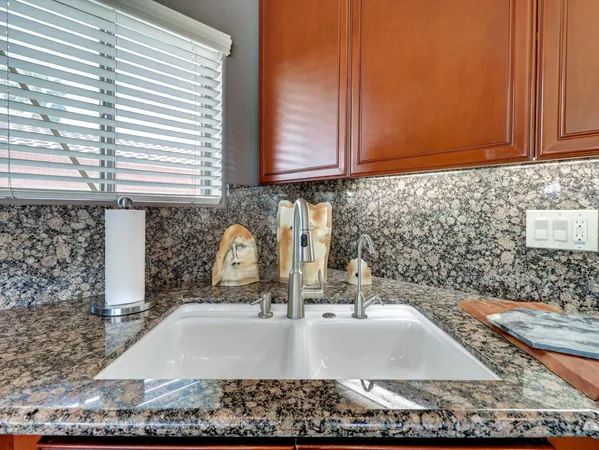 a view of entryway with livingroom and flower pot