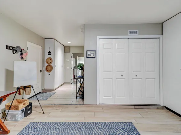 a bedroom with a bed and furniture