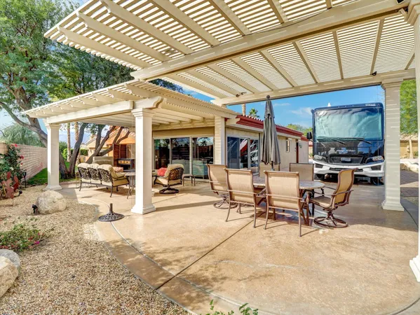 a view of a building with sitting area