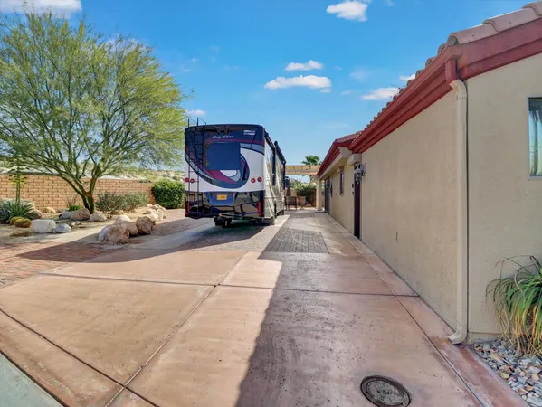 a kitchen with a table and chairs in it