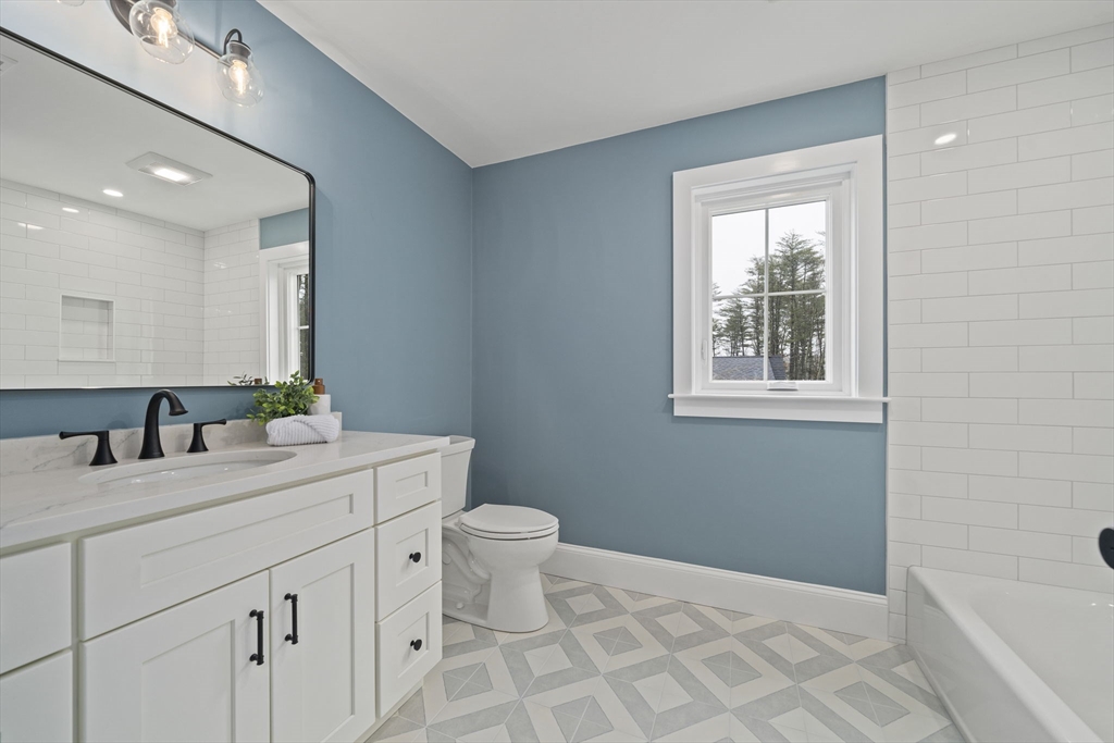 45 Red Gold Farm Road Marshfield, MA 02050 - Photo 27 of 40 a bathroom with a toilet sink and mirror