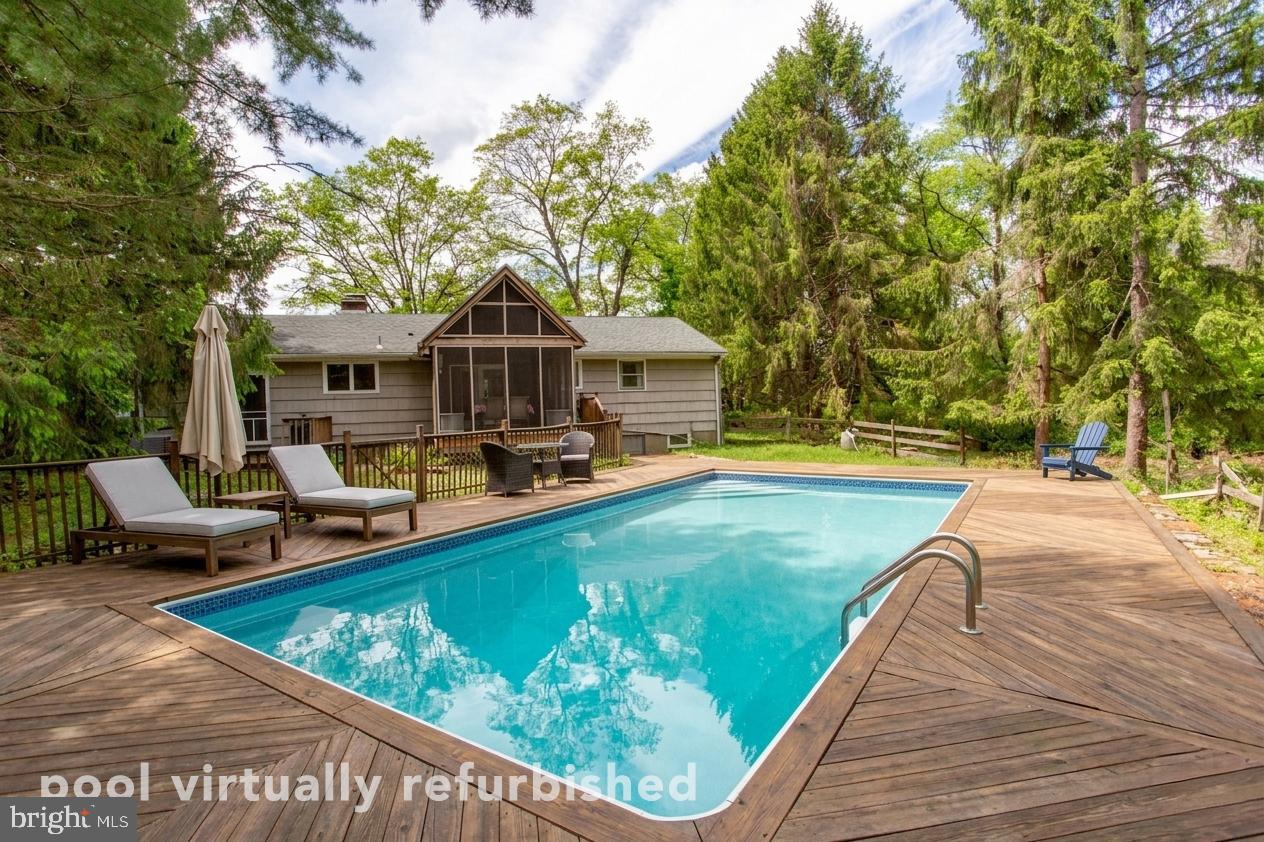 40 Union Road Clinton, NJ 08809 - Photo 29 of 41 Backyard - pool and pool deck virtually enhanced