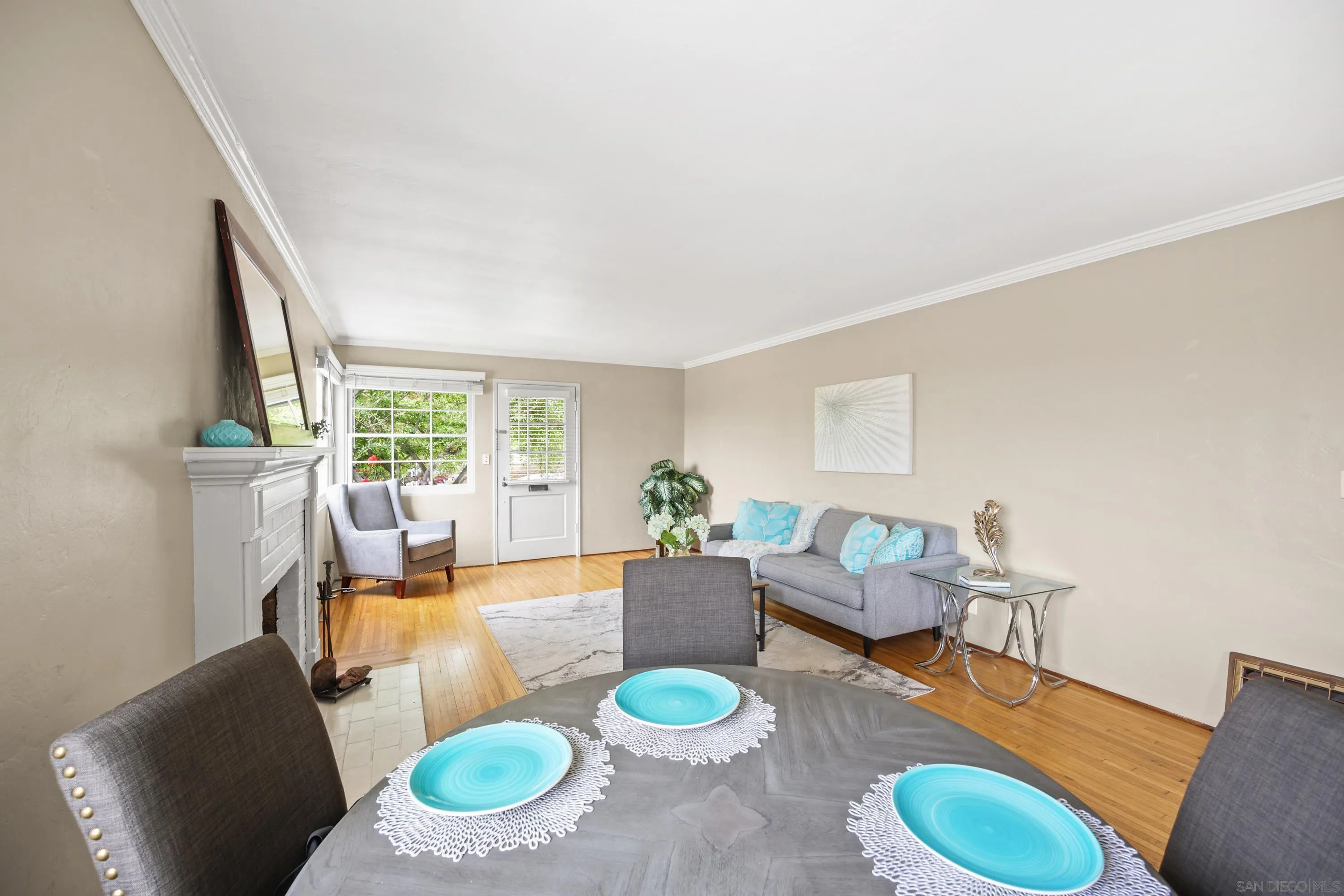 1205 Park Row La Jolla, CA 92037 - Photo 17 of 62 a living room with furniture and a wooden floor