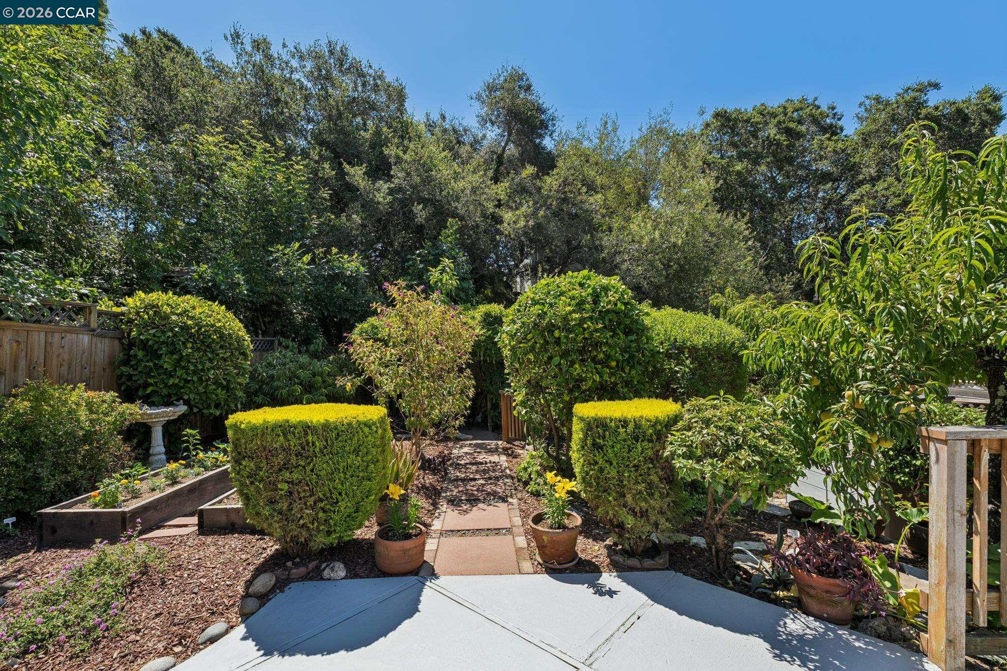 4034 Rusting Avenue Oakland, CA 94605 - Photo 40 of 52 a garden view with a seating space