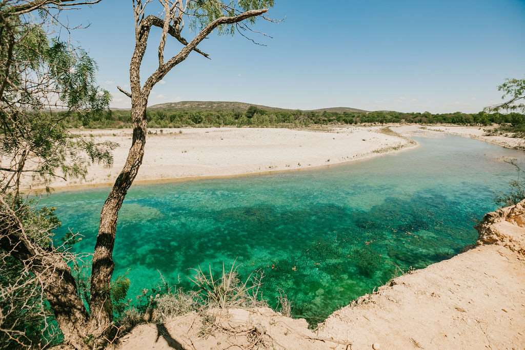 a view of a lake with an outdoor space