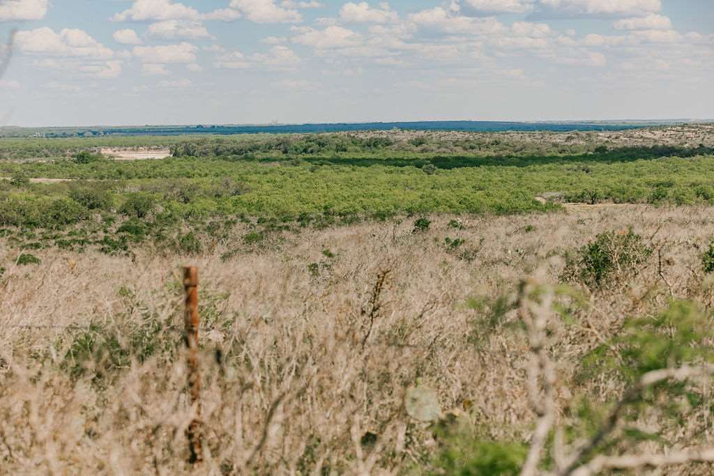 375 Co Road Uvalde, TX 78801 - Photo 18 of 30 a view of a field with beach and background