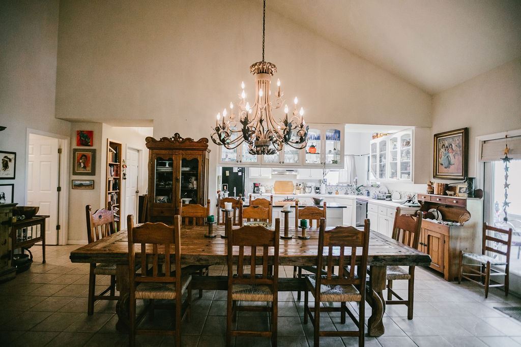 375 Co Road Uvalde, TX 78801 - Photo 20 of 30 a view of a dining room with furniture and wooden floor