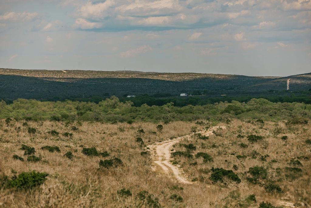 375 Co Road Uvalde, TX 78801 - Photo 4 of 30 a view of a lake with a city