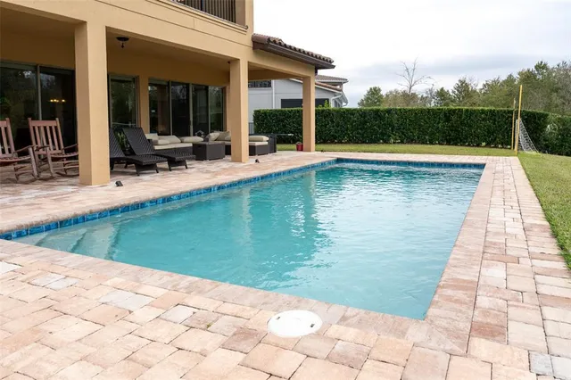 a kitchen with a stove a sink and a microwave