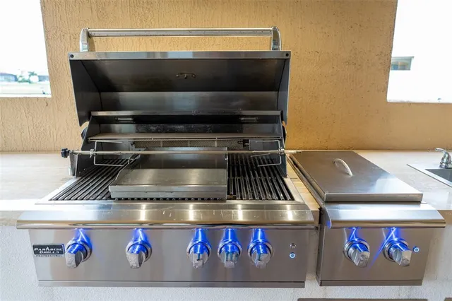 a kitchen with a sink and a cabinets