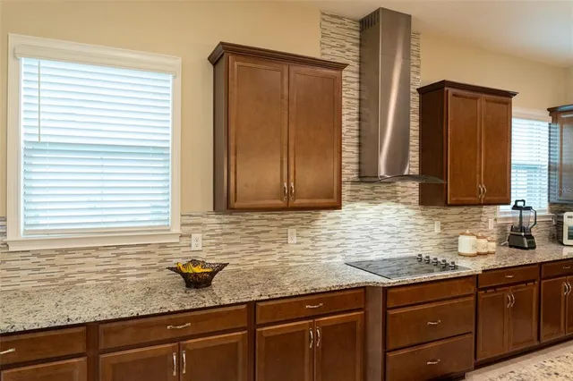 a view of balcony with yard