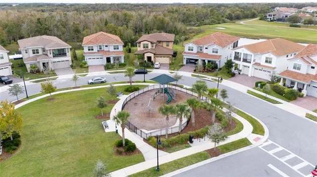 a view of a living room and chandelier