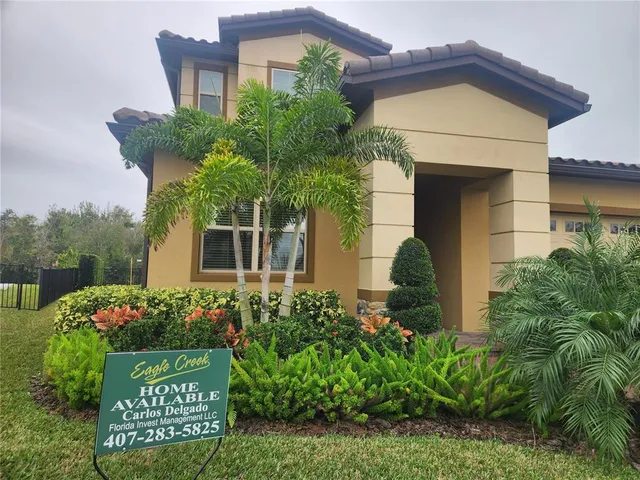 a view of a house with a swimming pool