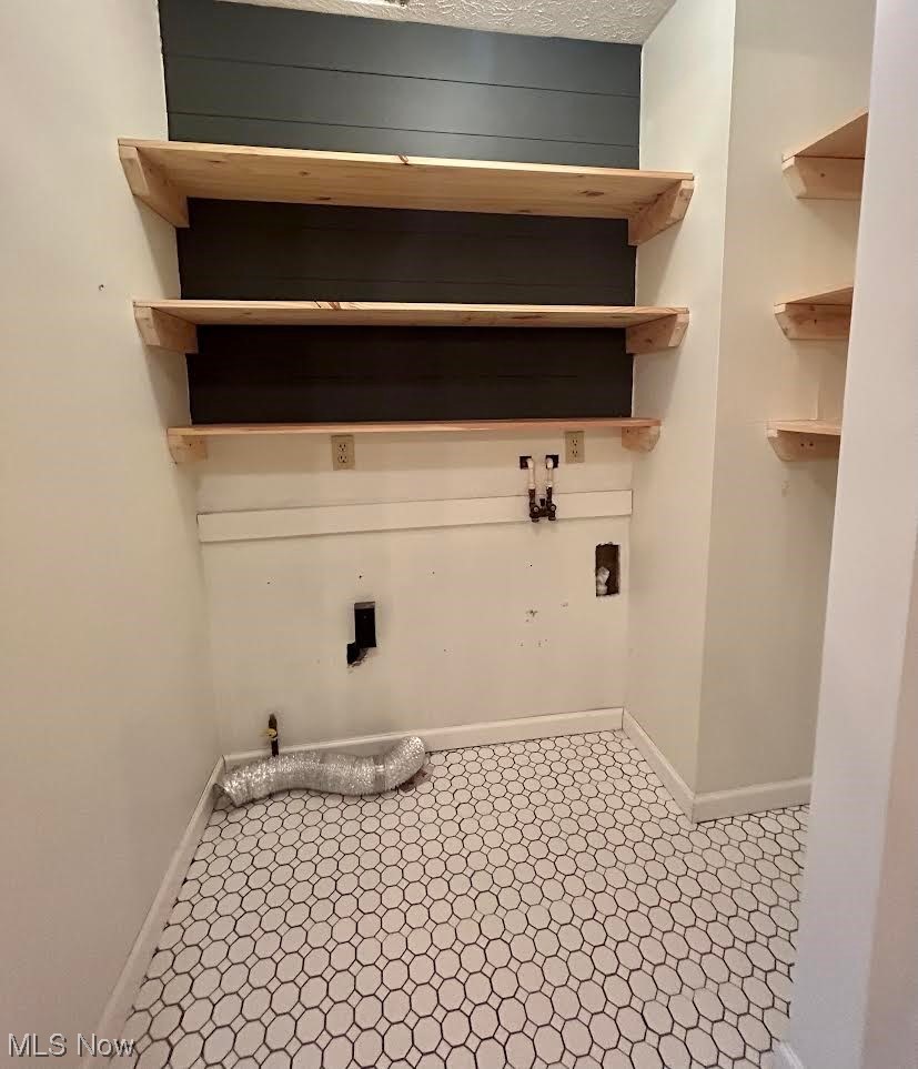 35 Chainey Run Road Marietta, OH 45750 - Photo 13 of 28 Laundry on main floor with
light tile flooring