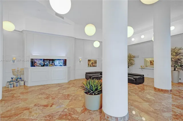 a view of a living room and window