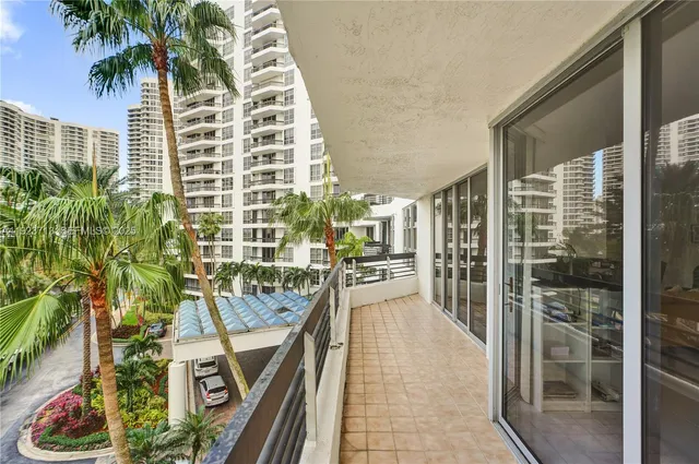 a view of balcony with a potted plant