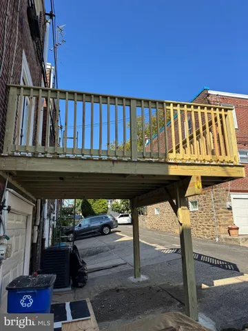 a view of entryway with a table and chairs