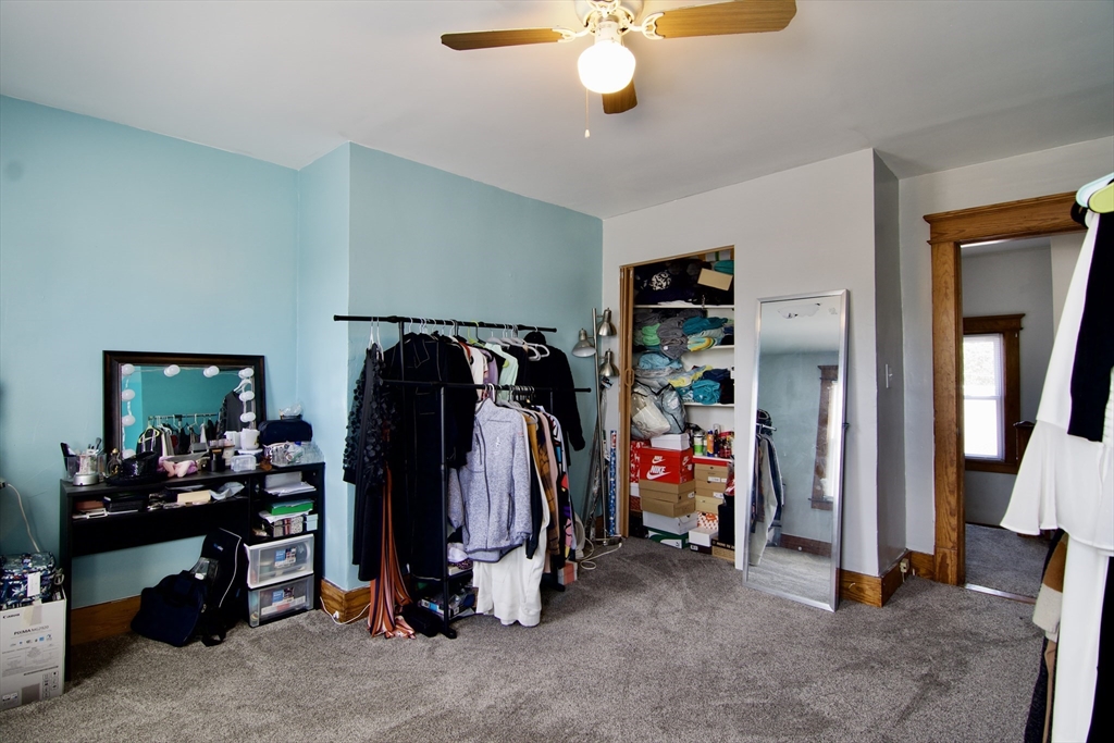16 Amity Court Springfield, MA 01108 - Photo 40 of 42 a view of walk in closet with clothes and shoes